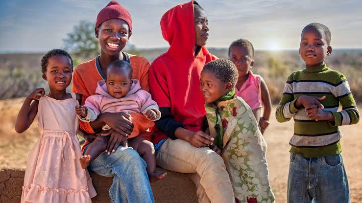 Community members and children